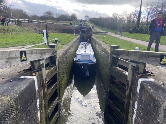 Narrowboat passing through a lock